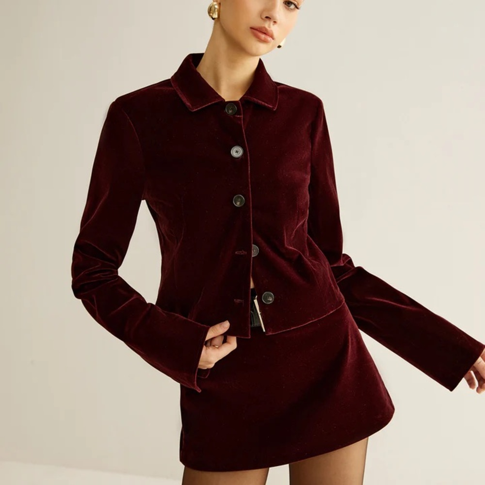 Elegant Burgundy Velvet Women's Jacket and skort set with belt.